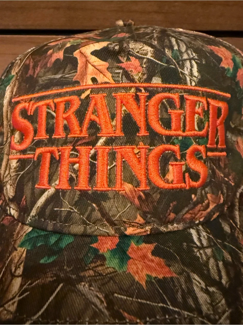 Stranger Things hard to find bright orange and camo embroidered SnapBack hat